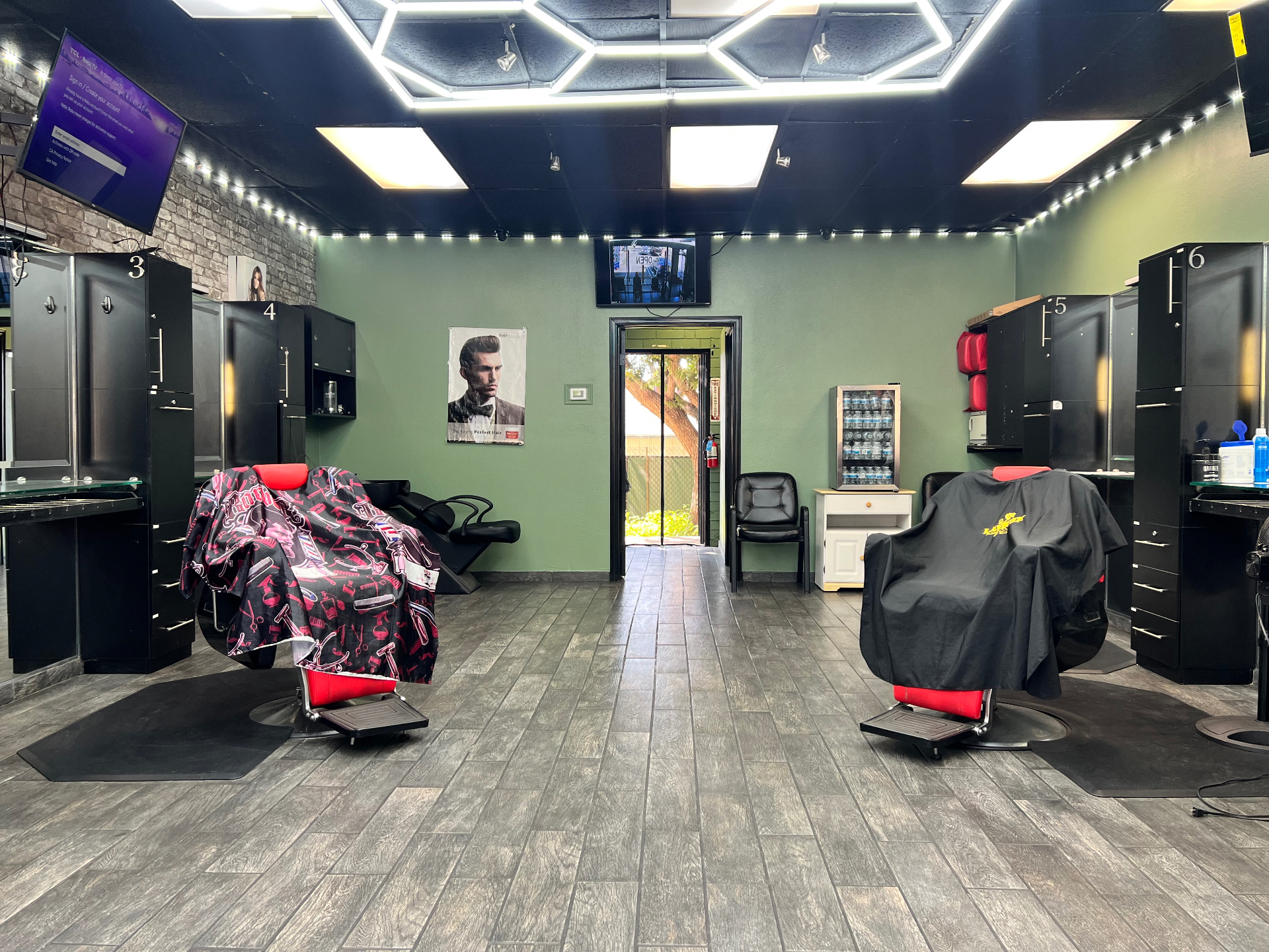 Booth rental chairs on the shop floor at Issa Barbershop